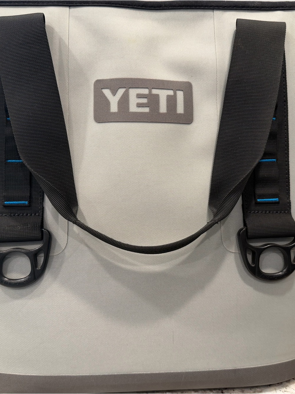 Yeti Duffel Bag in Light Gray with missing black strap
